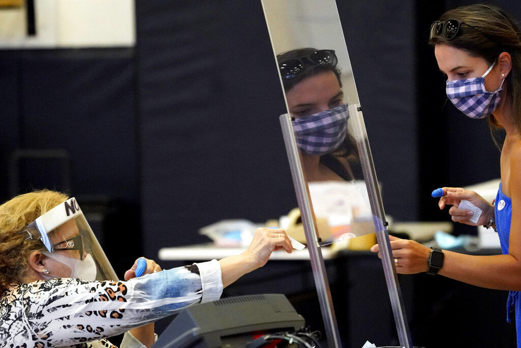 APTOPIX Virus Outbreak Texas Election